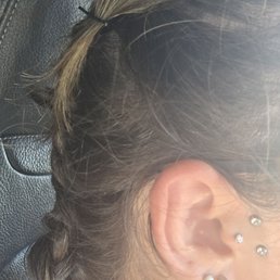 Surface tragus piercing and new tragus stud. Surface tragus piercing and new tragus stud.