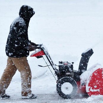 JS Handyman Service - a man using a snow blower - Handyman Near Me JS Handyman Service - a man using a snow blower - Handyman Near Me