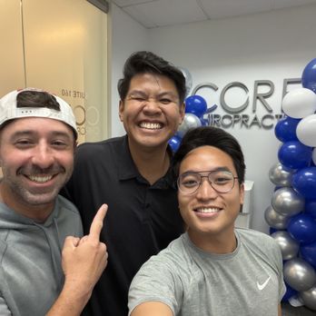 Masters Chiropractic Clinic - Patients in gray and Dr Vince in black - Chiropractors Near Me - Costa Mesa, California Masters Chiropractic Clinic - Patients in gray and Dr Vince in black - Chiropractors Near Me - Costa Mesa, California
