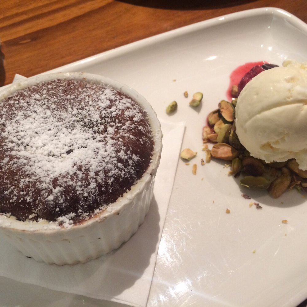 Chocolate Fondant Dessert with vanilla ice cream and pistachios $13 Chocolate Fondant Dessert with vanilla ice cream and pistachios $13