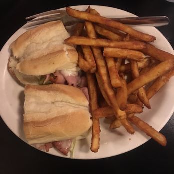 Creme Hut - a plate of french fries and a sandwich - Delis Near Me - Chatsworth, Georgia