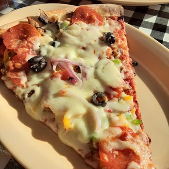 Italia Pizza Cafe - Single slice of Supreme... a meal in itself! - Pizza Near Me - Southaven, Mississippi Italia Pizza Cafe - Single slice of Supreme... a meal in itself! - Pizza Near Me - Southaven, Mississippi