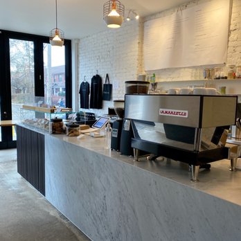 Contra Cafe - a coffee machine on the counter - Coffee & Tea Near Me - Toronto, Ontario