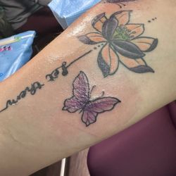 Herbertsville Tattoo - Added butterflies to the lotus I had done previously-