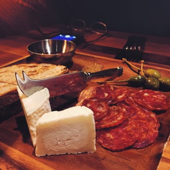 Saint & Second - Charcuterie plate with chorizo salami and aged goat cheese. - New American Near Me - Long Beach, California Saint & Second - Charcuterie plate with chorizo salami and aged goat cheese. - New American Near Me - Long Beach, California