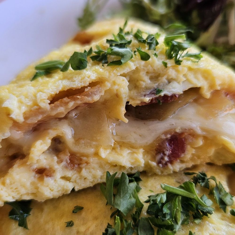Moulin - L'Omelette Paysanne with bacon and cheese. It was fine. - Bakeries Near Me - Newport Beach, California Moulin - L'Omelette Paysanne with bacon and cheese. It was fine. - Bakeries Near Me - Newport Beach, California