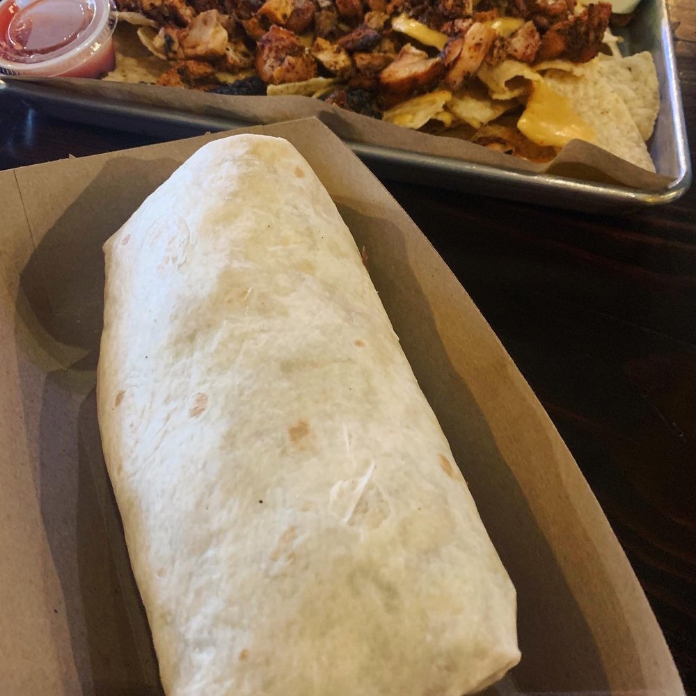 Muchachos Tacos & Food Truck - Hatch Mac Burrito (pork) and Chicken Nachos - Food Trucks Near Me - Lincoln, Nebraska Muchachos Tacos & Food Truck - Hatch Mac Burrito (pork) and Chicken Nachos - Food Trucks Near Me - Lincoln, Nebraska