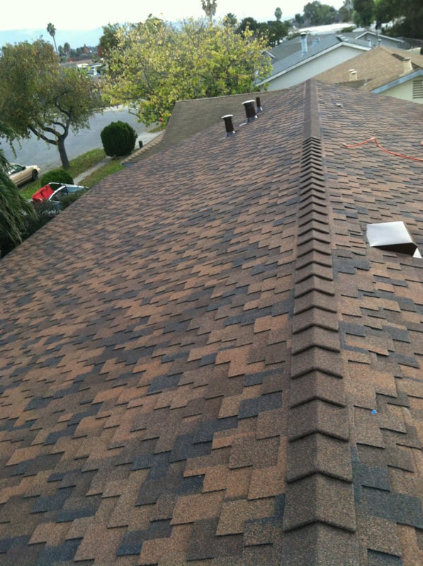 Slide of T J Roofing