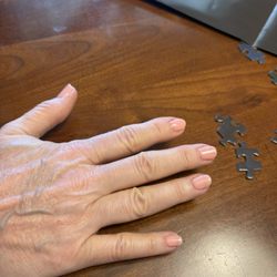 I'm not a glamour girl but I love understated beauty -- loved the manicure. (Disregard the puzzle pieces, please. It's a hobby.)