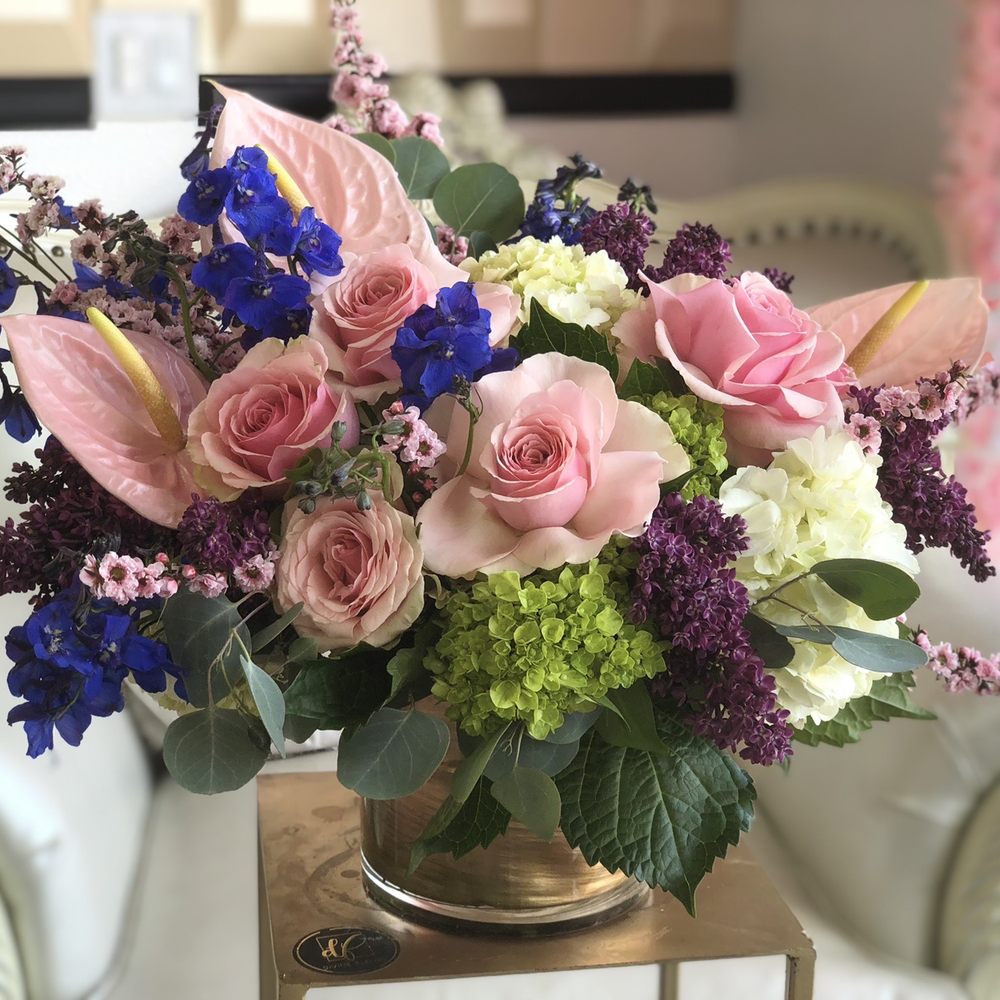 The beautiful arrangement with a little tropical flair.