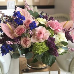 The beautiful arrangement with a little tropical flair. The beautiful arrangement with a little tropical flair.