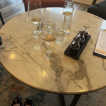 Dahlman Cellars - Wine tasting by the fireplace. - Wine Tasting Room Near Me - Tacoma, Washington Dahlman Cellars - Wine tasting by the fireplace. - Wine Tasting Room Near Me - Tacoma, Washington