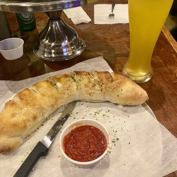 Moon Dog Pie House - The "Pretty Bird" Baked Chicken Stromboli - Italian Near Me - Fruit Cove, Florida Moon Dog Pie House - The "Pretty Bird" Baked Chicken Stromboli - Italian Near Me - Fruit Cove, Florida