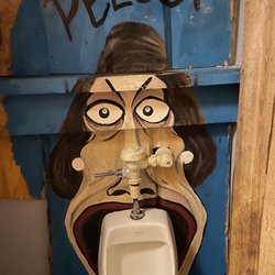 Who Cares Bar & No Grill - Men's bathroom.