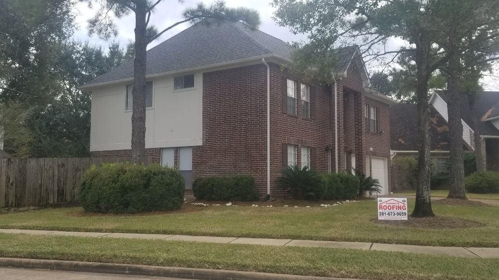 Slide of Johnny's Roofing and storm restoration
