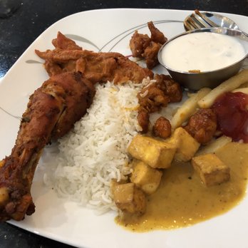 Curry Bowl - First trip to the buffet. Tandoori chicken, butter chicken,  paneer and Rita.   All very good. - Indian Near Me - Maitland, Florida