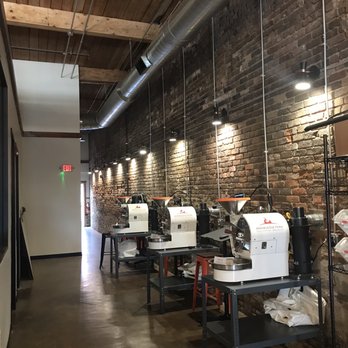 Knowledge Perk Coffee - a row of machines in a coffee shop - Coffee Roasteries Near Me - Rock Hill, South Carolina Knowledge Perk Coffee - a row of machines in a coffee shop - Coffee Roasteries Near Me - Rock Hill, South Carolina