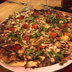 Pizzeria Babalou - A pizza using black truffle as the base!