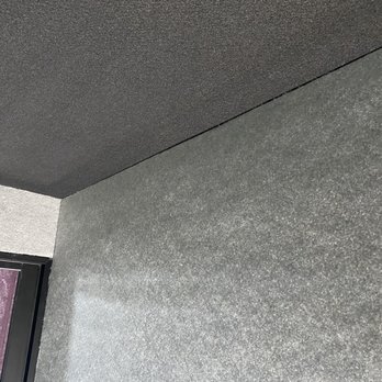 Magic Wallpapering - Seams line up between ceiling and wall - looks great - Wallpapering Near Me