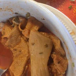 Knife skills, large pieces of tripe. Knife skills, large pieces of tripe.