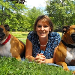Wigglin' Butts Pet Sitting & Dog Walking - Owner Christine Sanders and her two boxers, Murphy and Benny.