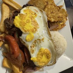 Julianna's Restaurant - Lomo Saltado a lo Porbre Style, no plantains sub Tostones Fritos