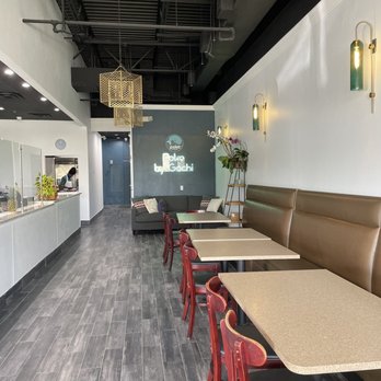 Poke By Gochi - a restaurant with tables and booths - Poke Near Me - Winter Garden, Florida