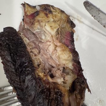 Terry Black's Barbecue - Extreme amount of fat. The black strip is ALL FAT, plus there's more visible fat I cut through to get the black piece off. Disgusting! - Barbeque Near Me - Houston, Texas Terry Black's Barbecue - Extreme amount of fat. The black strip is ALL FAT, plus there's more visible fat I cut through to get the black piece off. Disgusting! - Barbeque Near Me - Houston, Texas