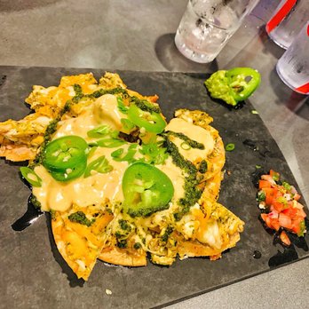Topgolf - Not good!...Sad stack of Nachos!! No flavor or and the cheese was some kind of fake government cheese!! - New American Near Me - Oxon Hill, Maryland Topgolf - Not good!...Sad stack of Nachos!! No flavor or and the cheese was some kind of fake government cheese!! - New American Near Me - Oxon Hill, Maryland