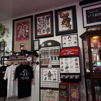 Spirit Tattoo - One of the walls in the lounge waiting area - Tattoo Near Me - San Diego, California Spirit Tattoo - One of the walls in the lounge waiting area - Tattoo Near Me - San Diego, California