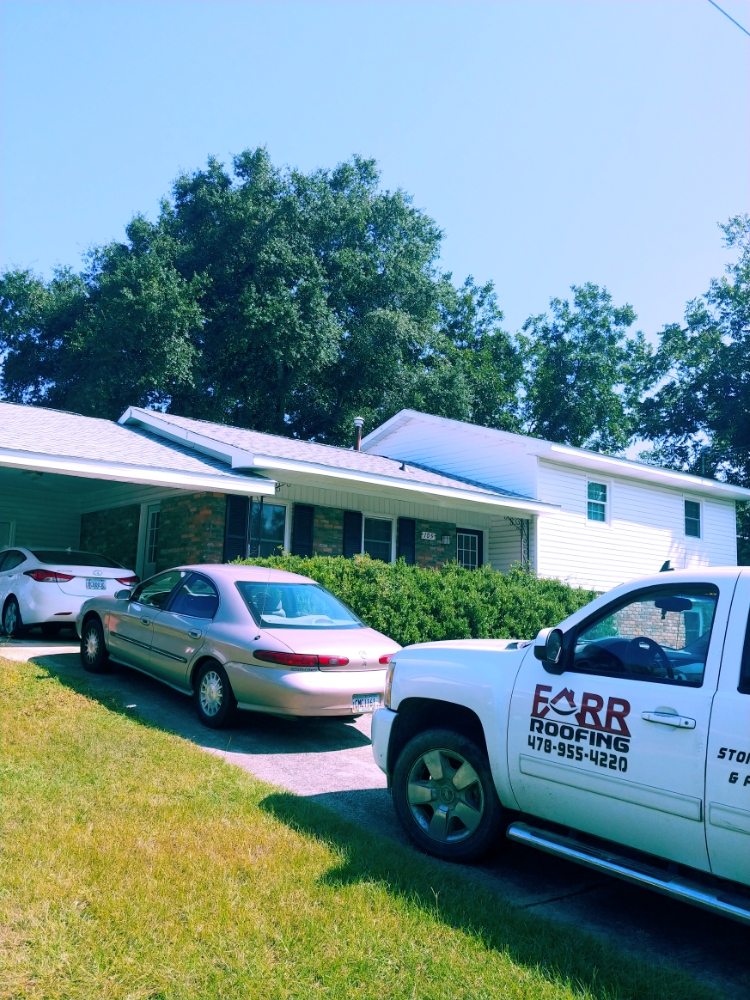 Slide of Farr Roofing