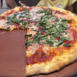 Margherita with signature sauce Margherita with signature sauce