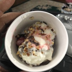 Baskin-Robbins - This is supposed to be a 2 scoop Sunday with two toppings.. They make a two scoop Sunday in a small cup.