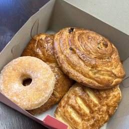 Different Croissants & the owner threw in a donut Different Croissants & the owner threw in a donut