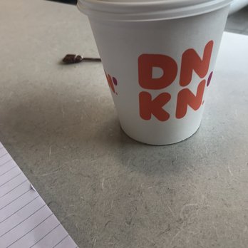 Dunkin' -  a cup of coffee on a table - Donuts Near Me - Monroe, New Jersey