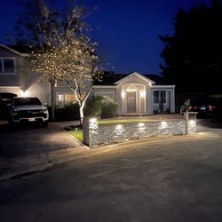 Meza Landscaping - Sitting wall with accent lights and built-in mailbox, plants, turf and other path lights