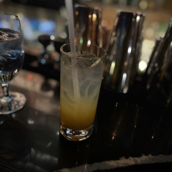 Bourbon N' Bubbles - Mango citrus splash mocktail - Bars Near Me - Charleston, South Carolina Bourbon N' Bubbles - Mango citrus splash mocktail - Bars Near Me - Charleston, South Carolina
