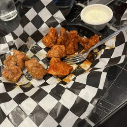 Roadhouse Grill - 50 cent boneless wings on Wednesday (their homemade ranch is awesome!)