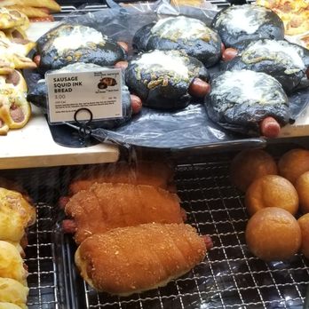 Tous Les Jours - Sausage squid ink bread - Coffee & Tea Near Me - Chicago, Illinois Tous Les Jours - Sausage squid ink bread - Coffee & Tea Near Me - Chicago, Illinois