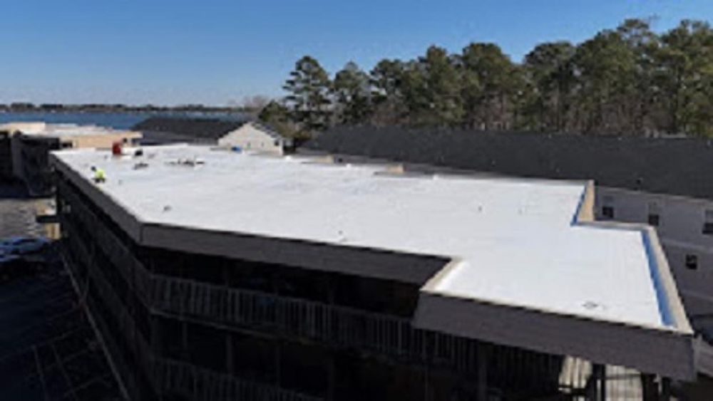 Slide of PMI Roofing & Renovations