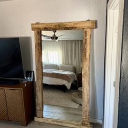 Large, carved mirror