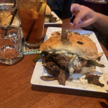 Lucky Beaver Bar & Burger - High Steaks sliced filet mignon, smothered w/grilled onions mushrooms, jalapenos melted pepper jack ciabatta bun garlic aioli. - Sports Bars Near Me - Stateline, Nevada