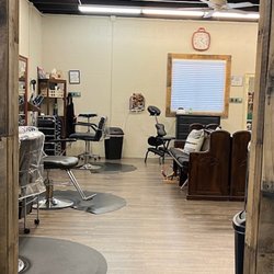 Tanglez Hair & Nail Salon - Salon side with pew seating