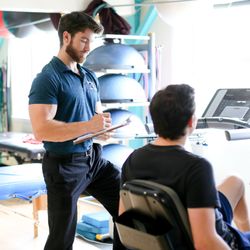 Santa Cruz Core Fitness + Rehab - Personal trainer and Co-Founder Beau Jansen performing a health analysis on a new client.