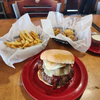 Stomp's Burger Joint - Sun Up burger, side of fries (they are purchased separate from the burger) and rattlesnake eggs. - Burgers Near Me - Bacliff, Texas Stomp's Burger Joint - Sun Up burger, side of fries (they are purchased separate from the burger) and rattlesnake eggs. - Burgers Near Me - Bacliff, Texas