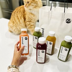 Cold Pressed Celery Juice, Strawberry Orange Mango Smoothie, Candy Kittens Wild Strawberry! Kitty not included