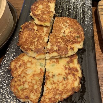 Tang Restaurant - Mung bean pancakes with half missing! - Korean Near Me - Flushing, New York Tang Restaurant - Mung bean pancakes with half missing! - Korean Near Me - Flushing, New York