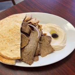 a plate of food on a table a plate of food on a table