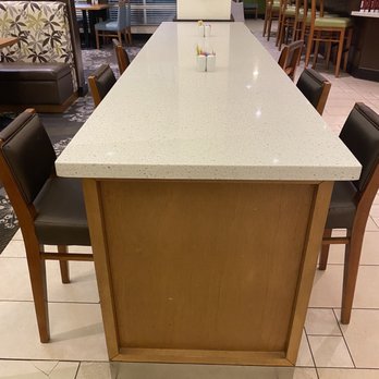 Hilton Garden Inn Covington/Mandeville - Work counter in lobby with Zero electrical outlets or USB ports. - Hotels Near Me - Covington, Louisiana Hilton Garden Inn Covington/Mandeville - Work counter in lobby with Zero electrical outlets or USB ports. - Hotels Near Me - Covington, Louisiana