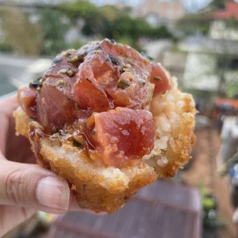 Kealoha Seafoods - a hand holding a piece of food - Food Stands Near Me - Honolulu, Hawaii Kealoha Seafoods - a hand holding a piece of food - Food Stands Near Me - Honolulu, Hawaii
